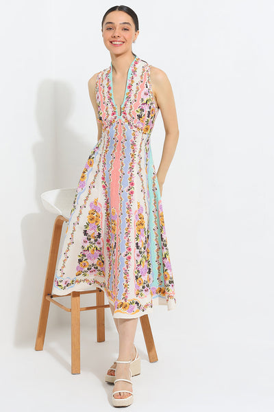 Simran Luthria in Aviva Halter Fit Flare Midi Dress