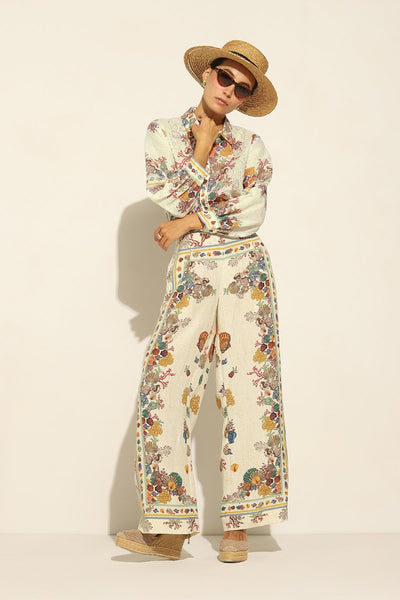 Ivory Wide Leg Pants by ranna gill with a floral and seashell pattern.