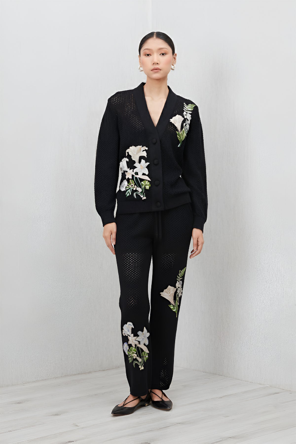 Ranna Gill Black knit embroidered floral co-ord set with button front top.