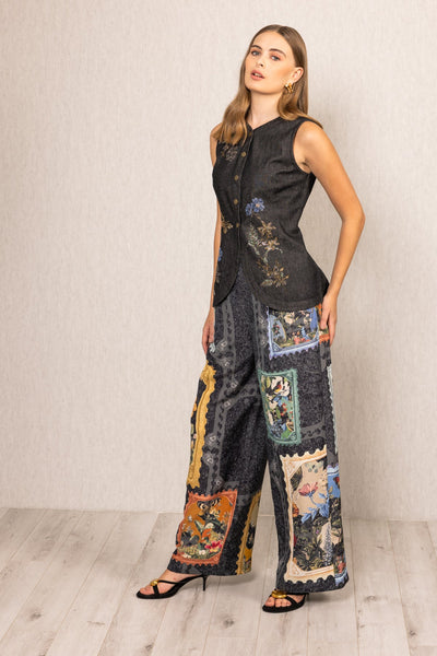 A sleeveless top and wide-leg pants with a patchwork design 
