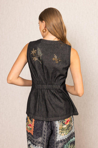 A black sleeveless top with floral embroidery 