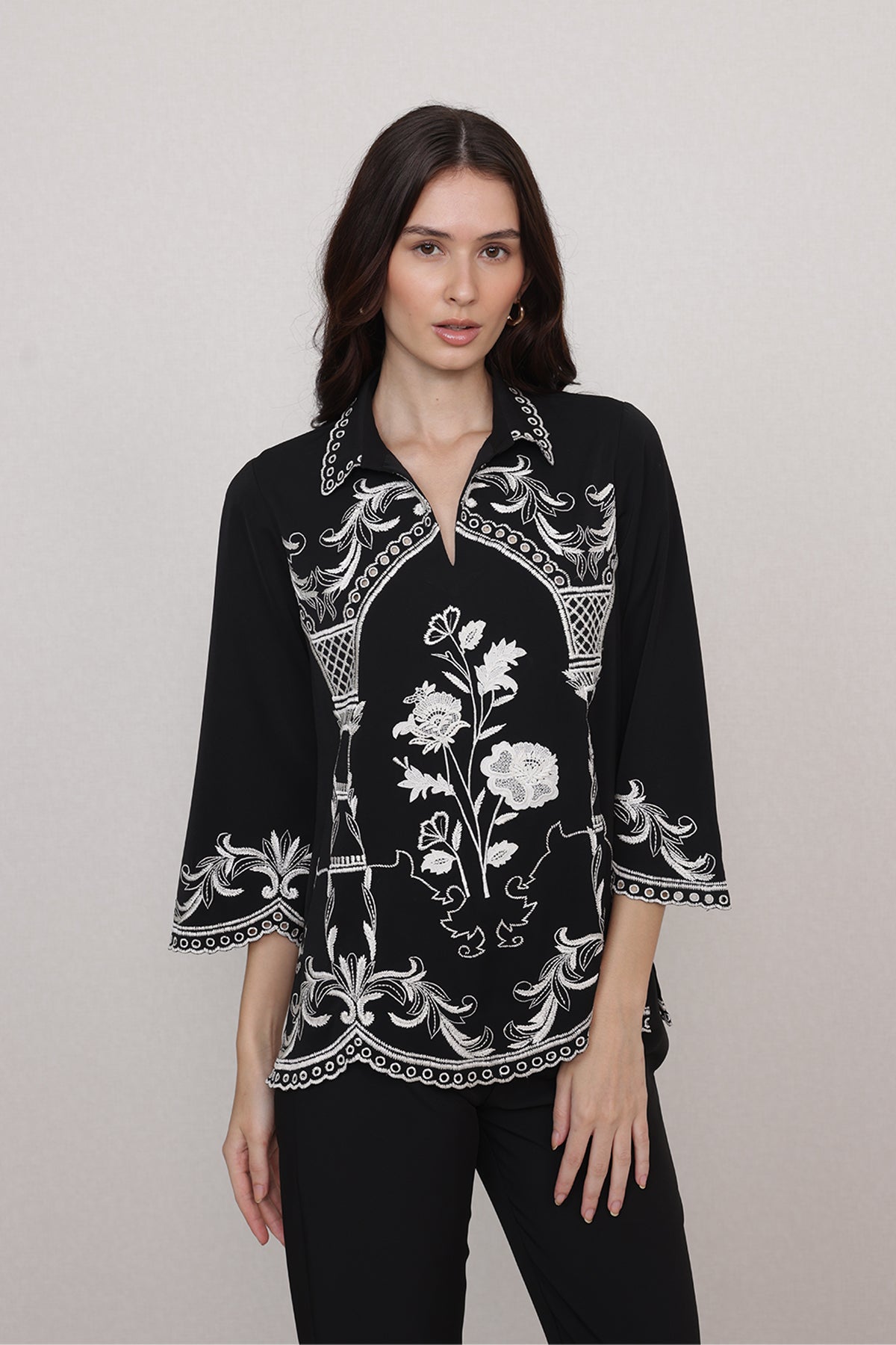 Ranna Gill Casa Black China Crepe Blouse with white floral embroidery and flared bishop sleeves.