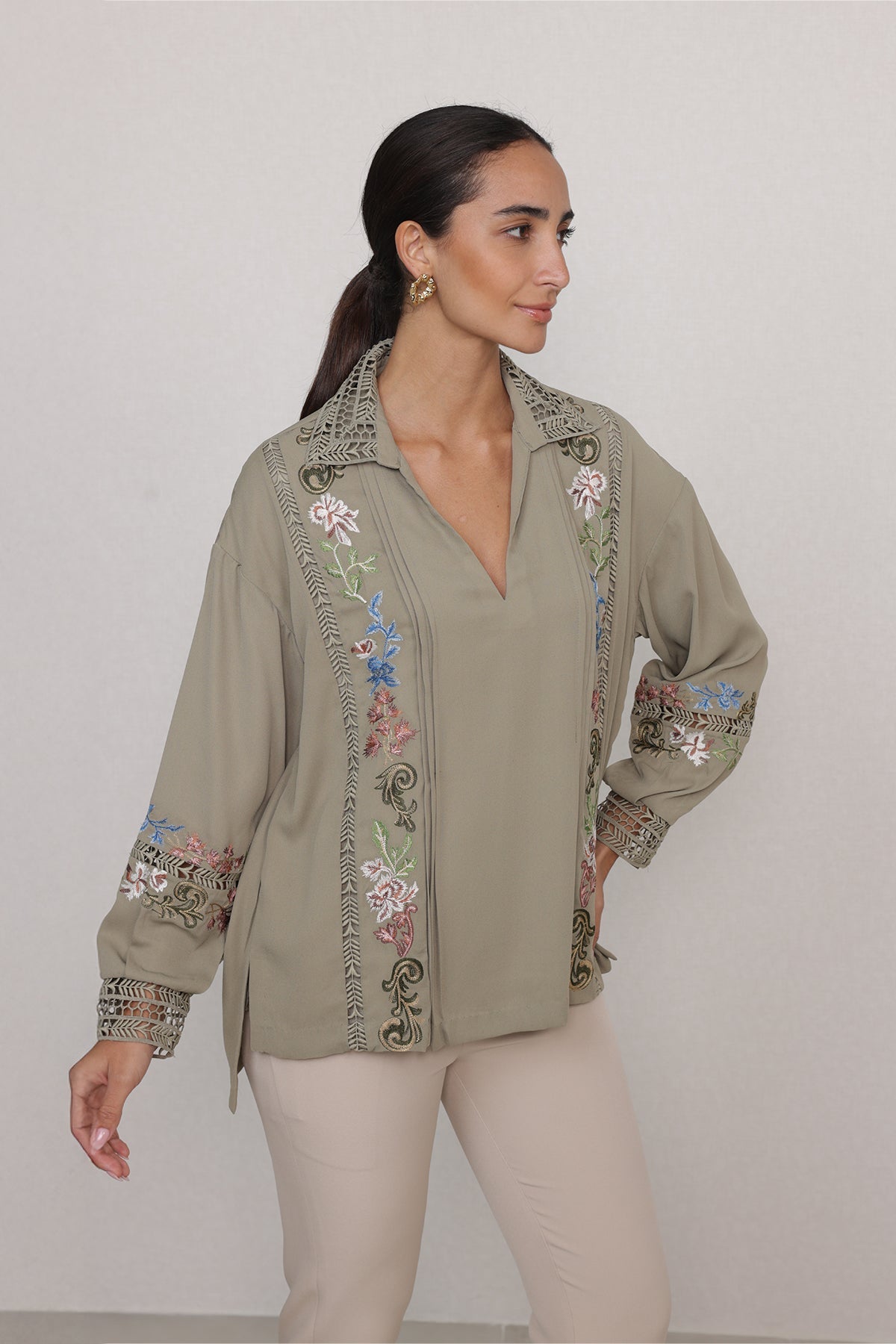 Ranna Gill Vinara Blouse in light olive georgette with embroidered vines and bishop sleeves.