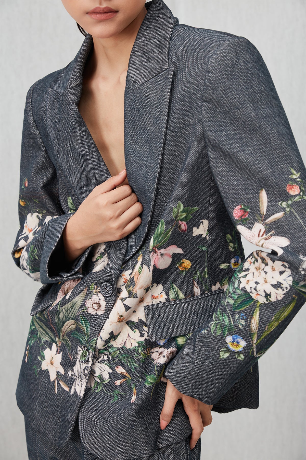 Ranna Gill Serah Jacket in grey corduroy with floral print and structured fit.