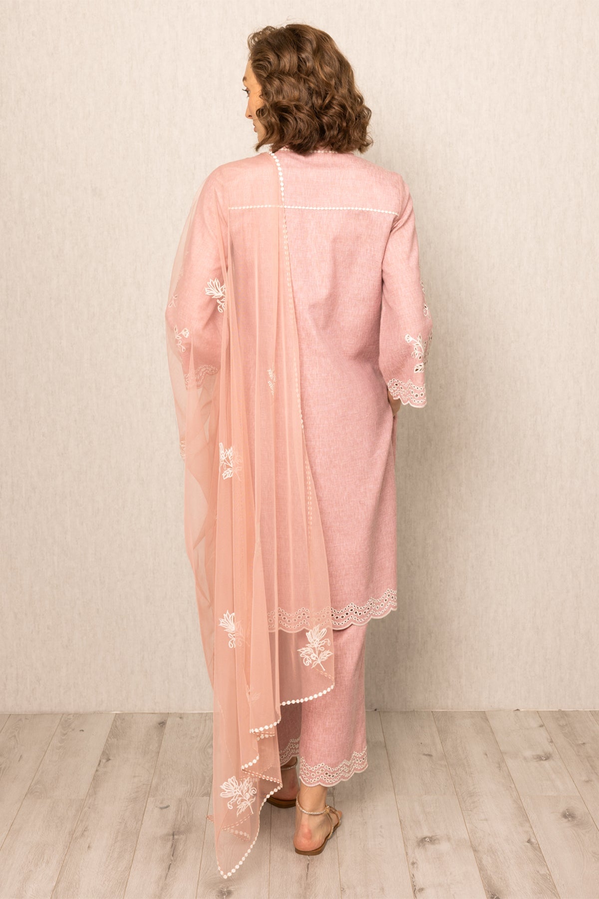 Ranna Gill pink tunic set with white floral embroidery, paired with matching pants and a sheer dupatta 