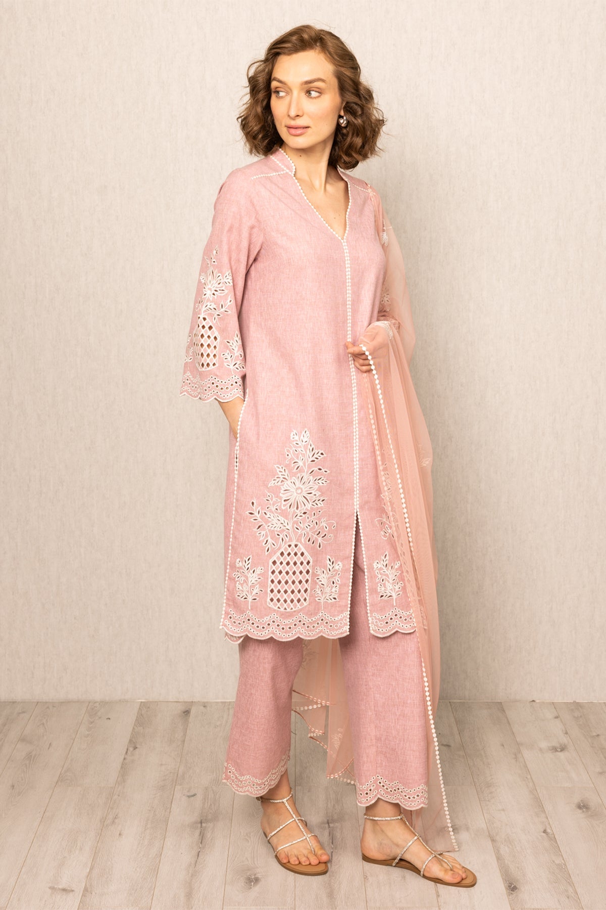 Ranna Gill pink tunic set with white floral embroidery, paired with matching pants and a sheer dupatta 
