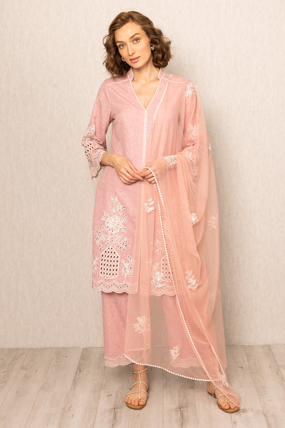 Ranna Gill pink tunic set with white floral embroidery, paired with matching pants and a sheer dupatta 