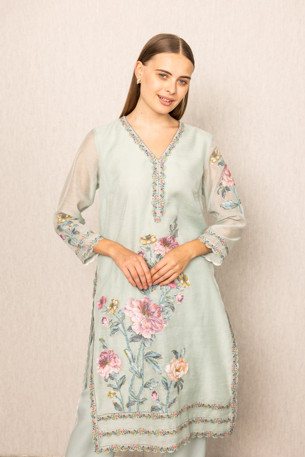 Ranna Gill Oraya Tunic Set in sage green Linen with pastel floral embroidery.