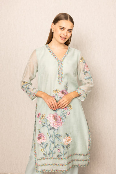 Ranna Gill Oraya Tunic Set in sage green Linen with pastel floral embroidery.