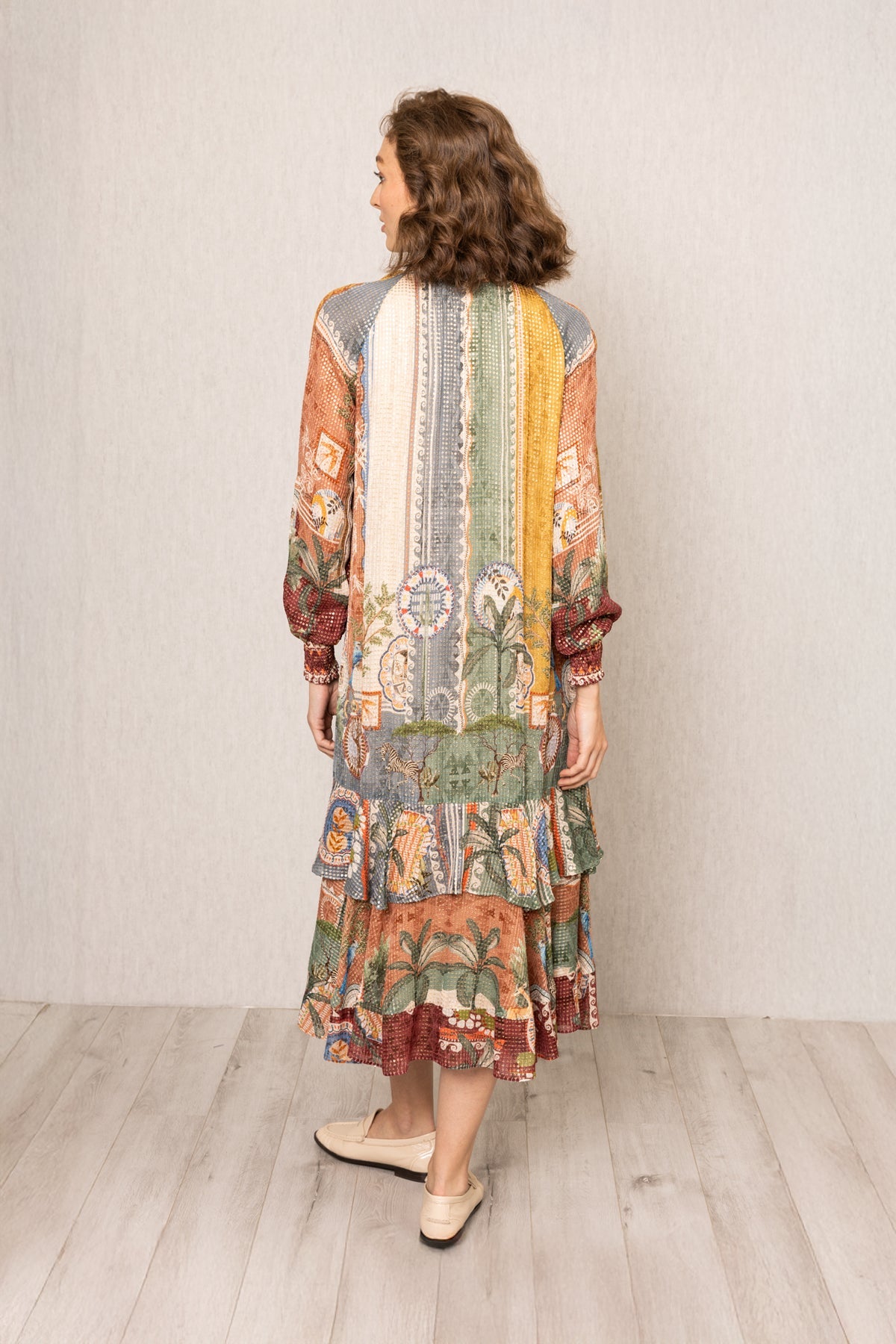 Woman wearing Tula Gathered Midi Dress in multi-color Santa Fe print by Ranna Gill.
