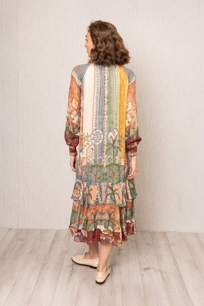 Woman wearing Tula Gathered Midi Dress in multi-color Santa Fe print by Ranna Gill.