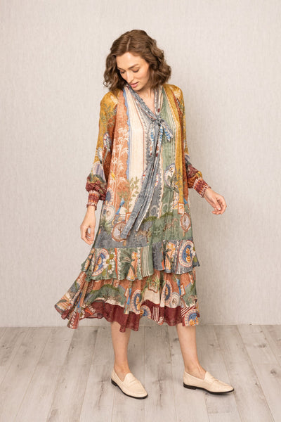 Woman wearing Tula Gathered Midi Dress in multi-color Santa Fe print by Ranna Gill.