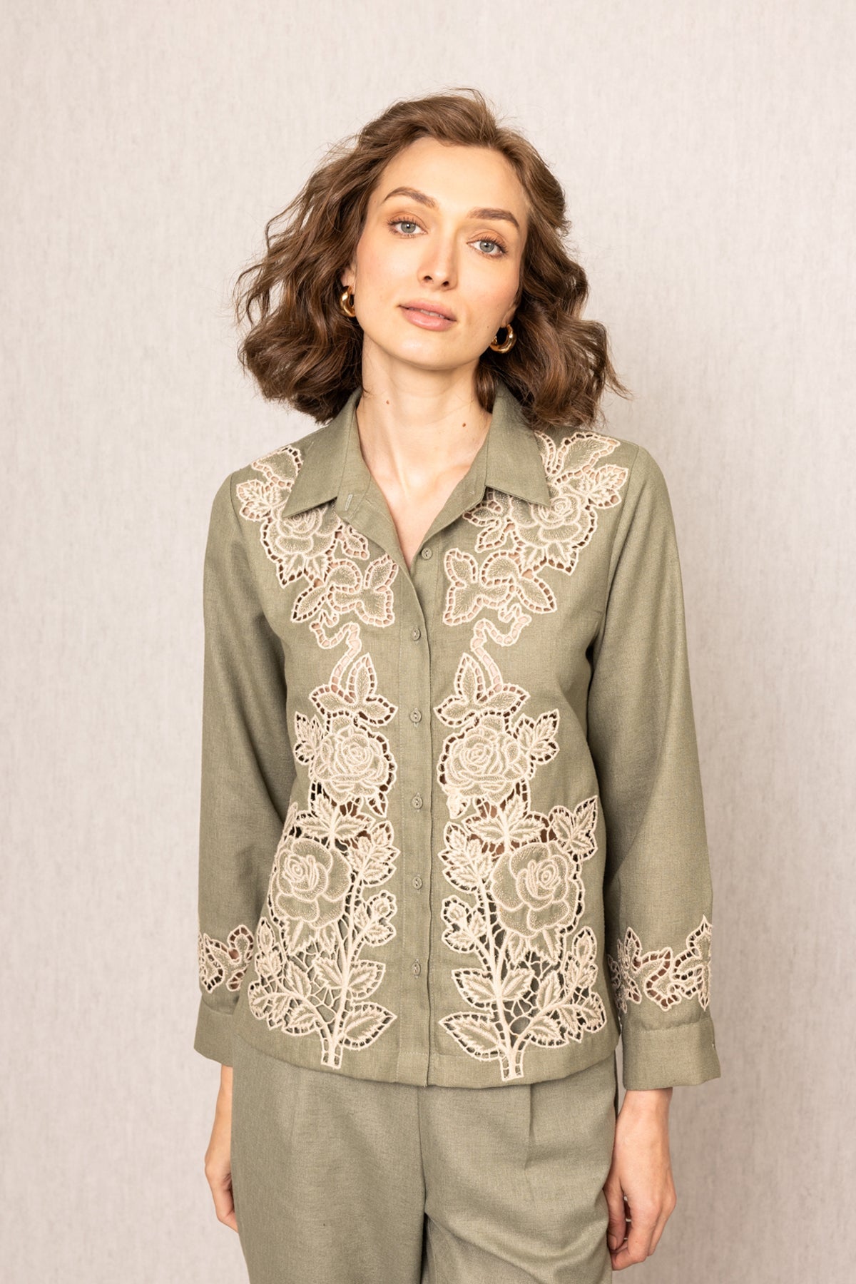 Sage green Rio Buttondown Shirt by ranna gill in Poly Flex with Floral embroidery on collar, panels, sleeves, and hem