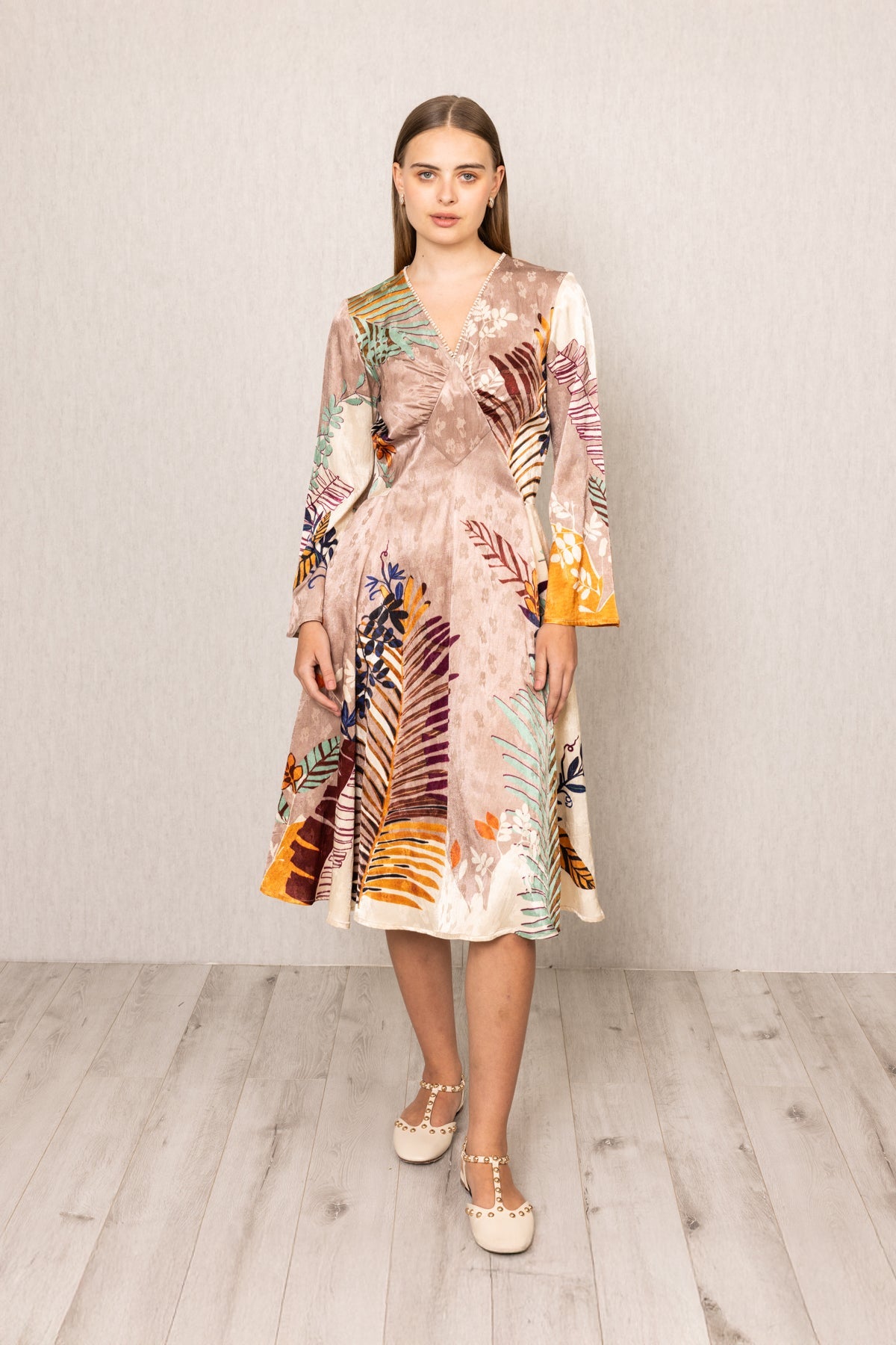 Ranna Gill Ken Diamond Panel Midi Dress in Moma print with wrap V-neck and flared sleeves.