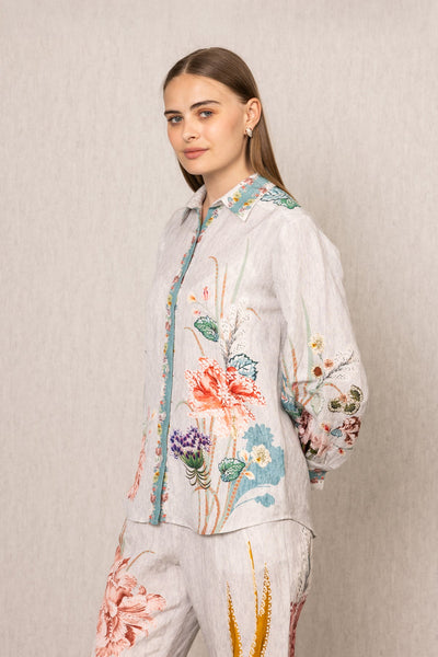 Ranna Gill Bora Co-ord Set in White linen with Floral buttondown shirt and tailored pants.