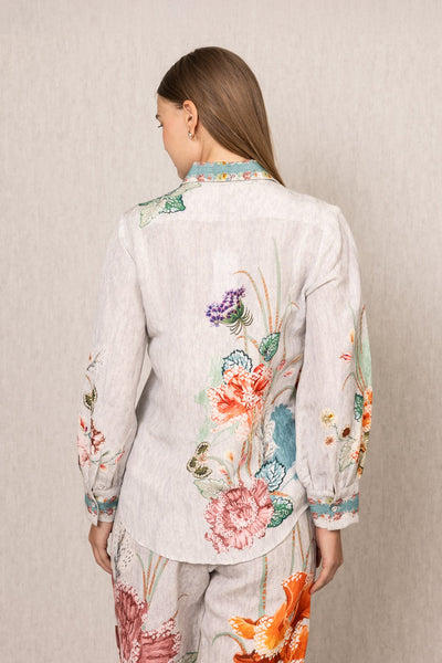 Ranna Gill Bora Co-ord Set in White linen with Floral buttondown shirt and tailored pants.