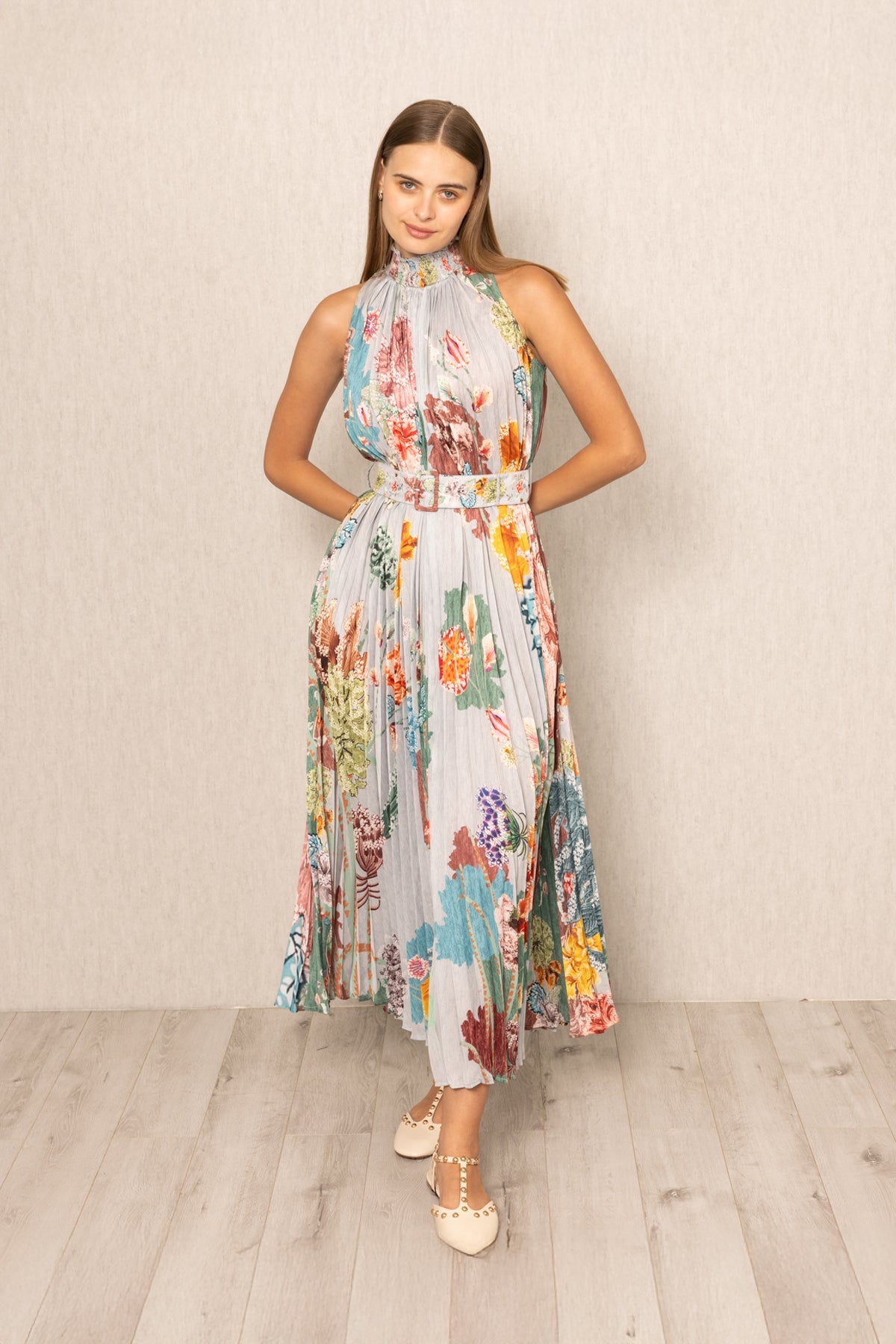 Ranna Gill Malaga Pleated Maxi Dress, high neckline floral maxi & pleated skirt.