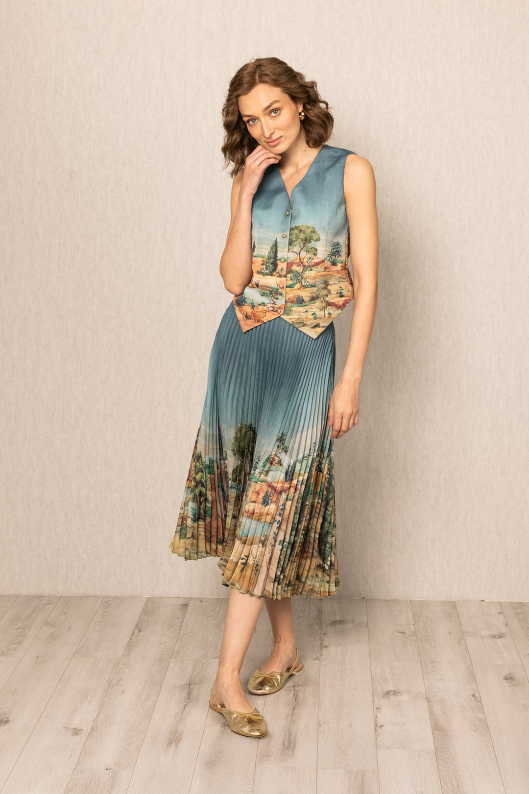 Ranna Gill Ibiza Waist Coat in teal blue satin with Tuscany print and button-down front.
