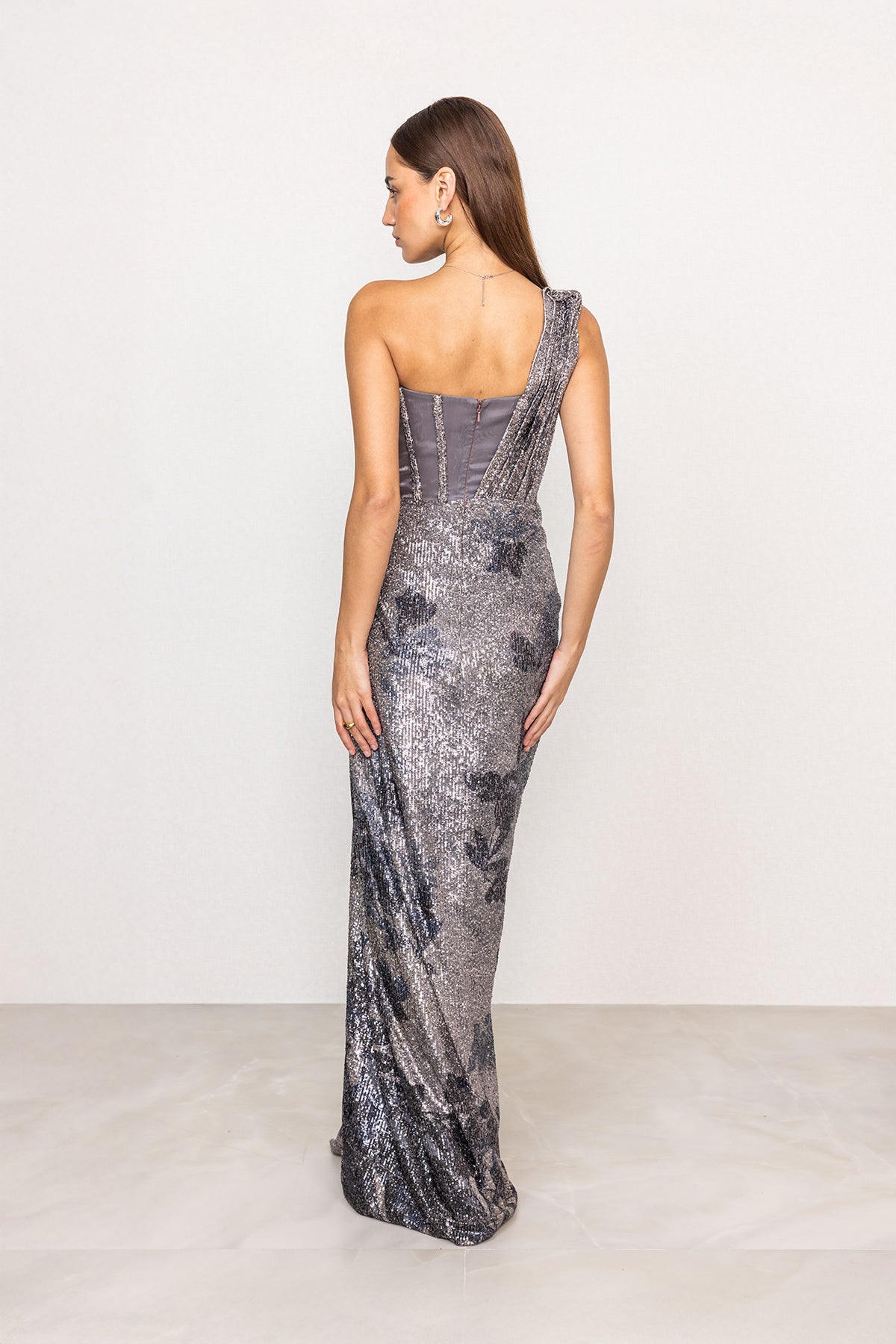 Ranna Gill Emberline Grey One Shoulder Floral Sequin Drape Gown.