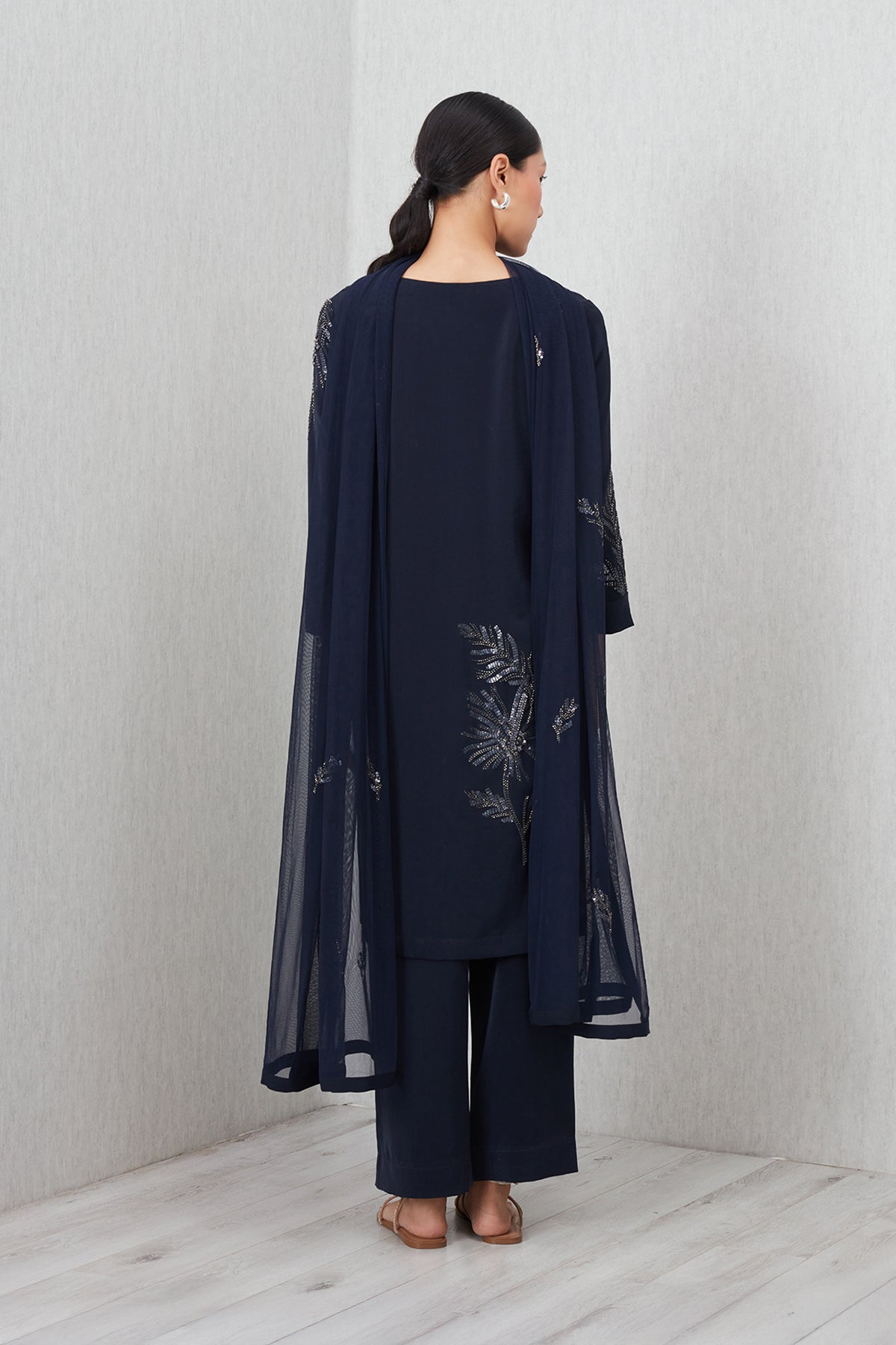 Ranna Gill Tara Tunic Set in navy blue with sequin floral embroidery, featuring a V-neck tunic, straight pants, and matching dupatta.