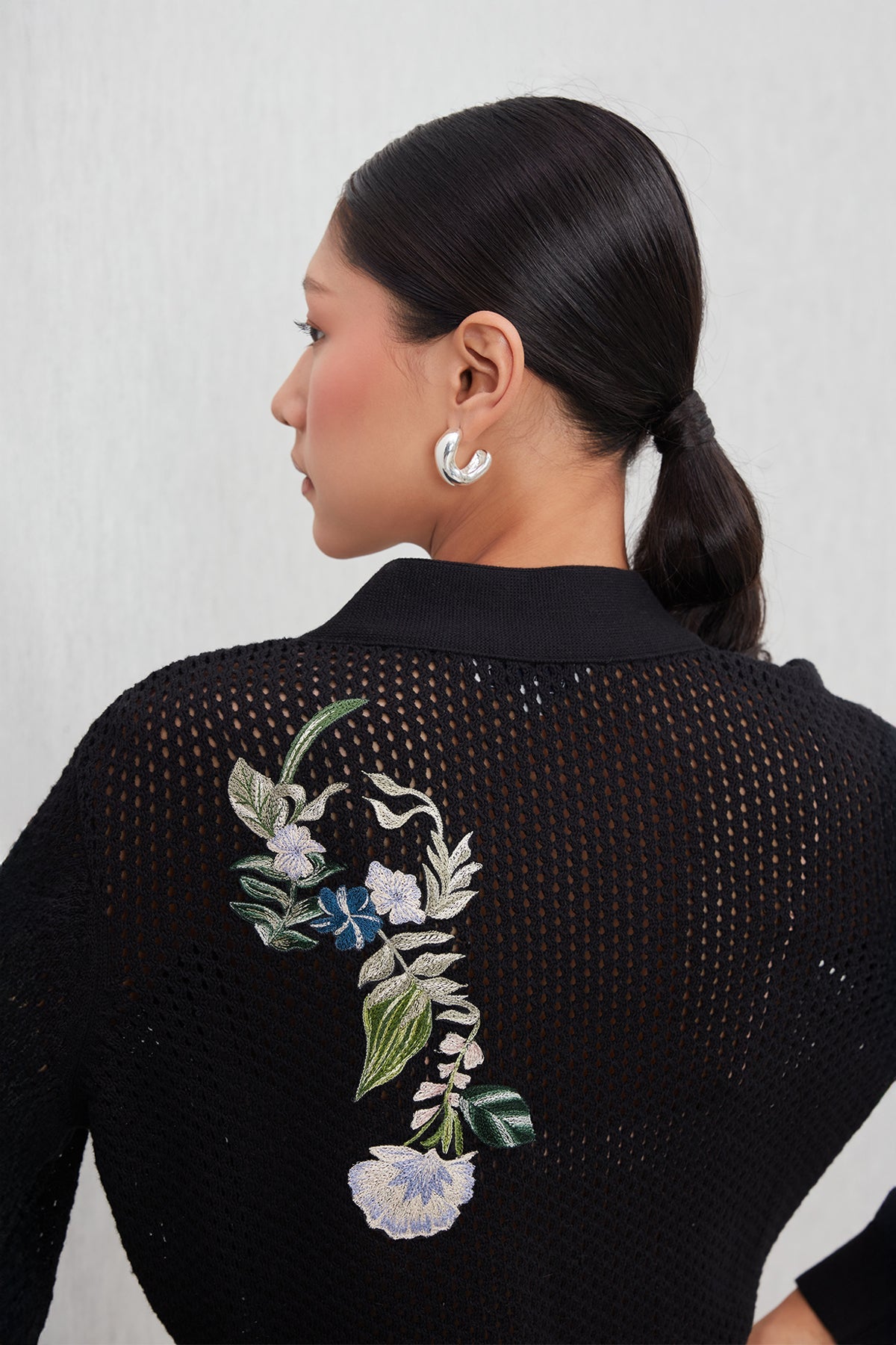 Ranna Gill Black knit embroidered floral co-ord set with button front top.