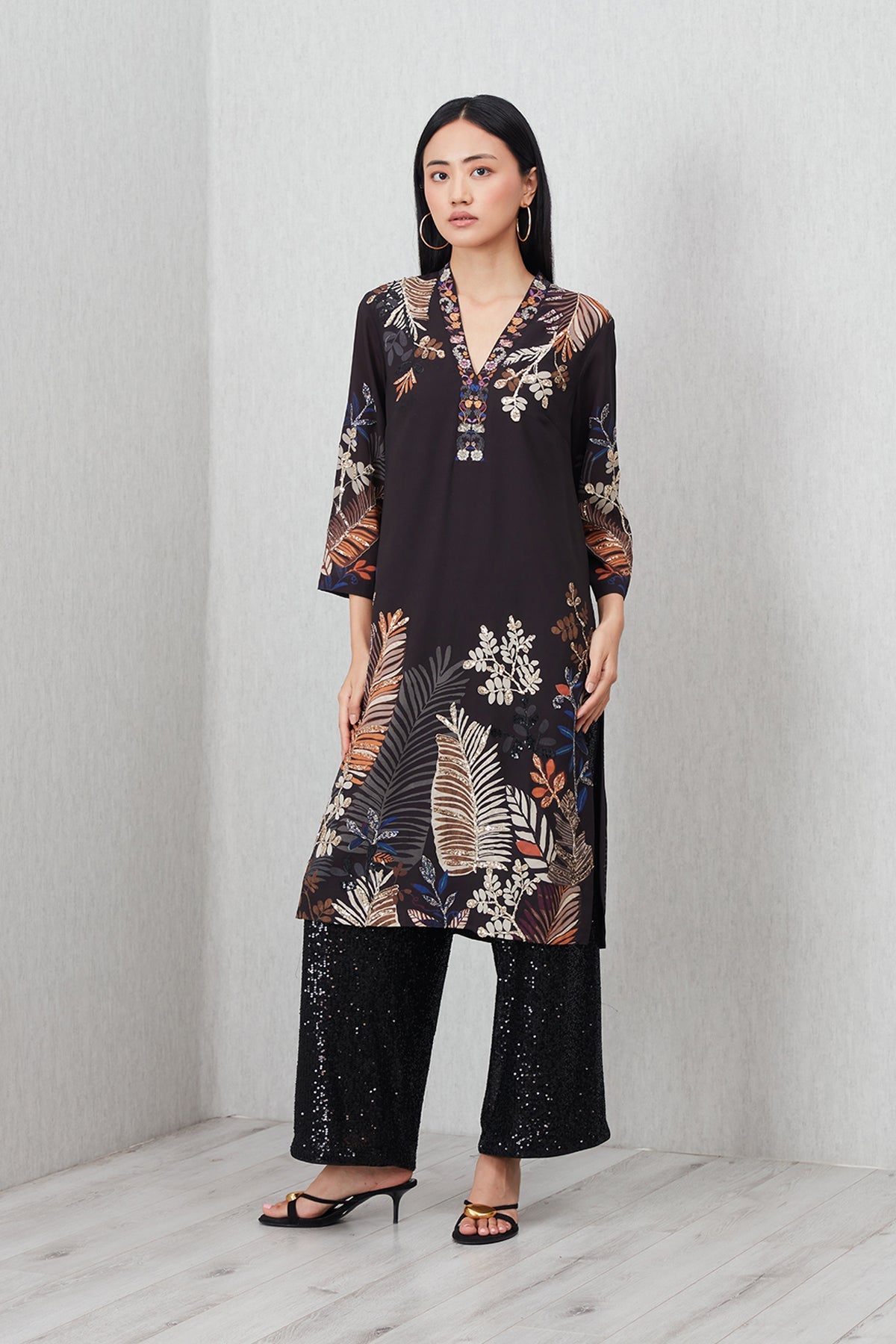 Ranna Gill Virelle Tunic Set in black with autumn foliage print & mirror neckline.