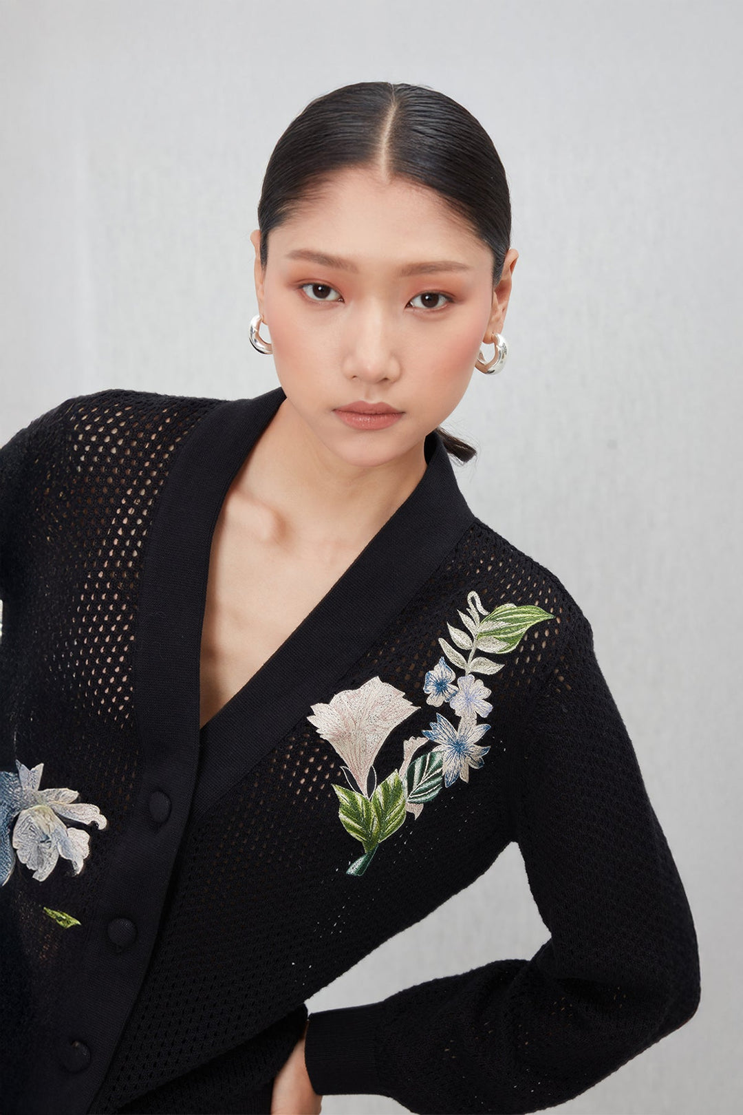 Ranna Gill Black knit embroidered floral co-ord set with button front top.