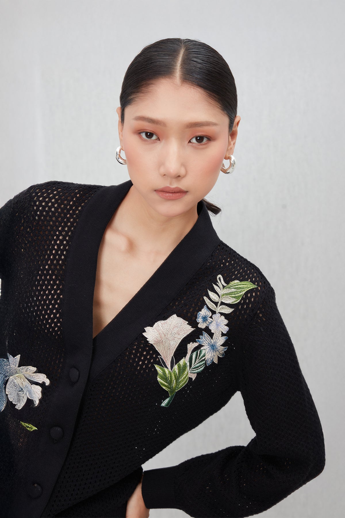 Ranna Gill Black knit embroidered floral co-ord set with button front top.