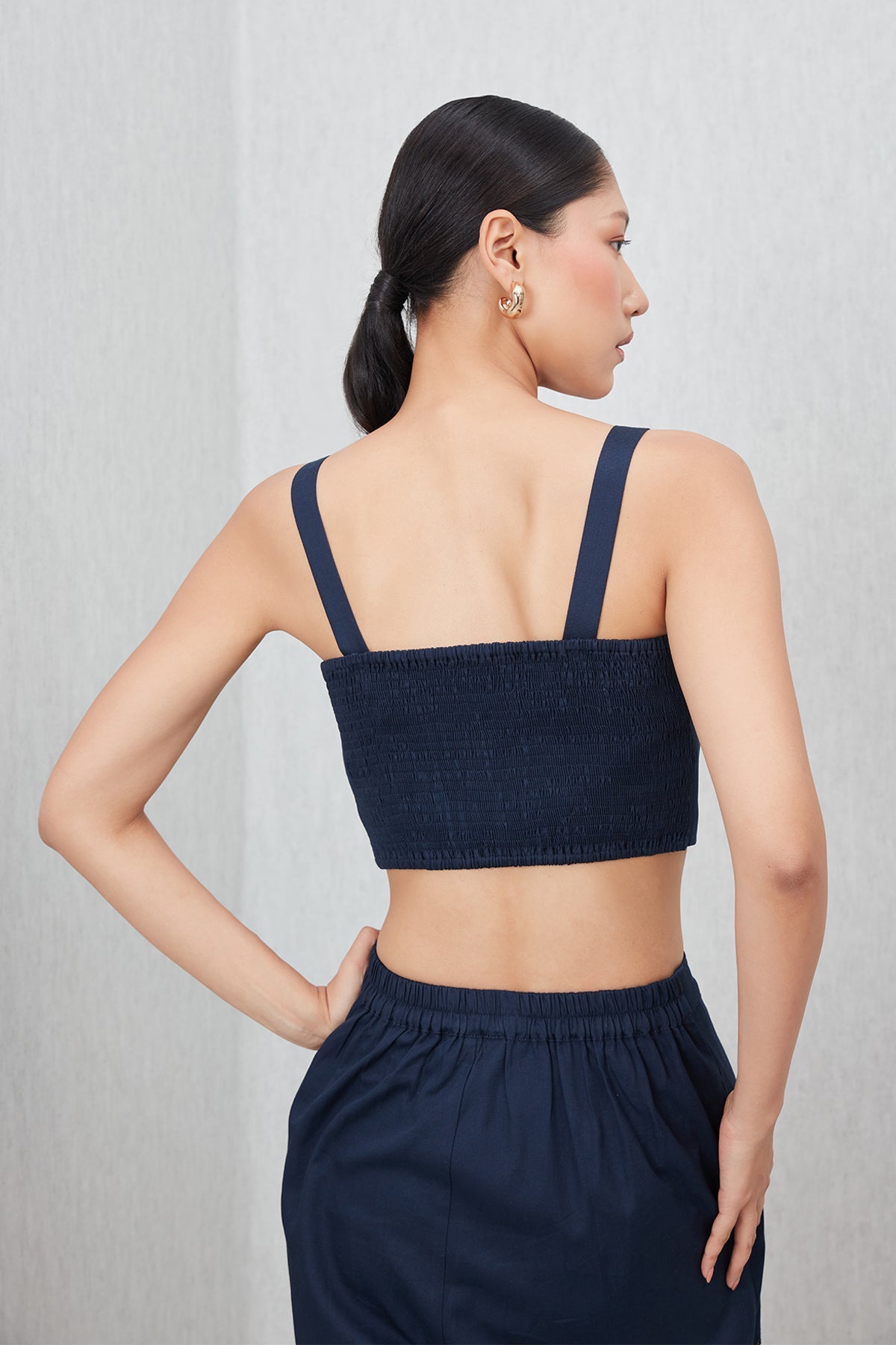 Ranna Gill Tammie Bustier in navy blue cotton twill with tonal floral applique and sequins.