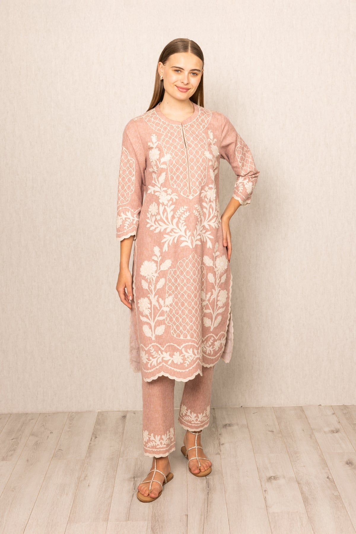 A pink floral embroidered Tunic Set