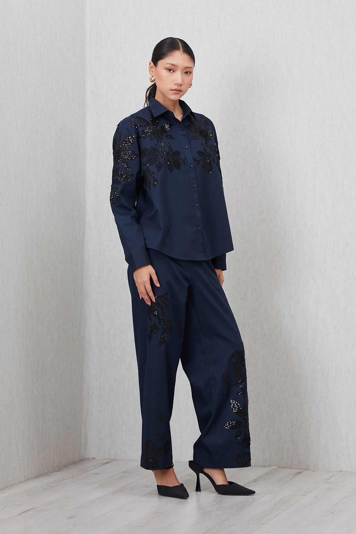 Ranna Gill Tara High Waisted Pants in navy blue cotton twill with tonal applique.