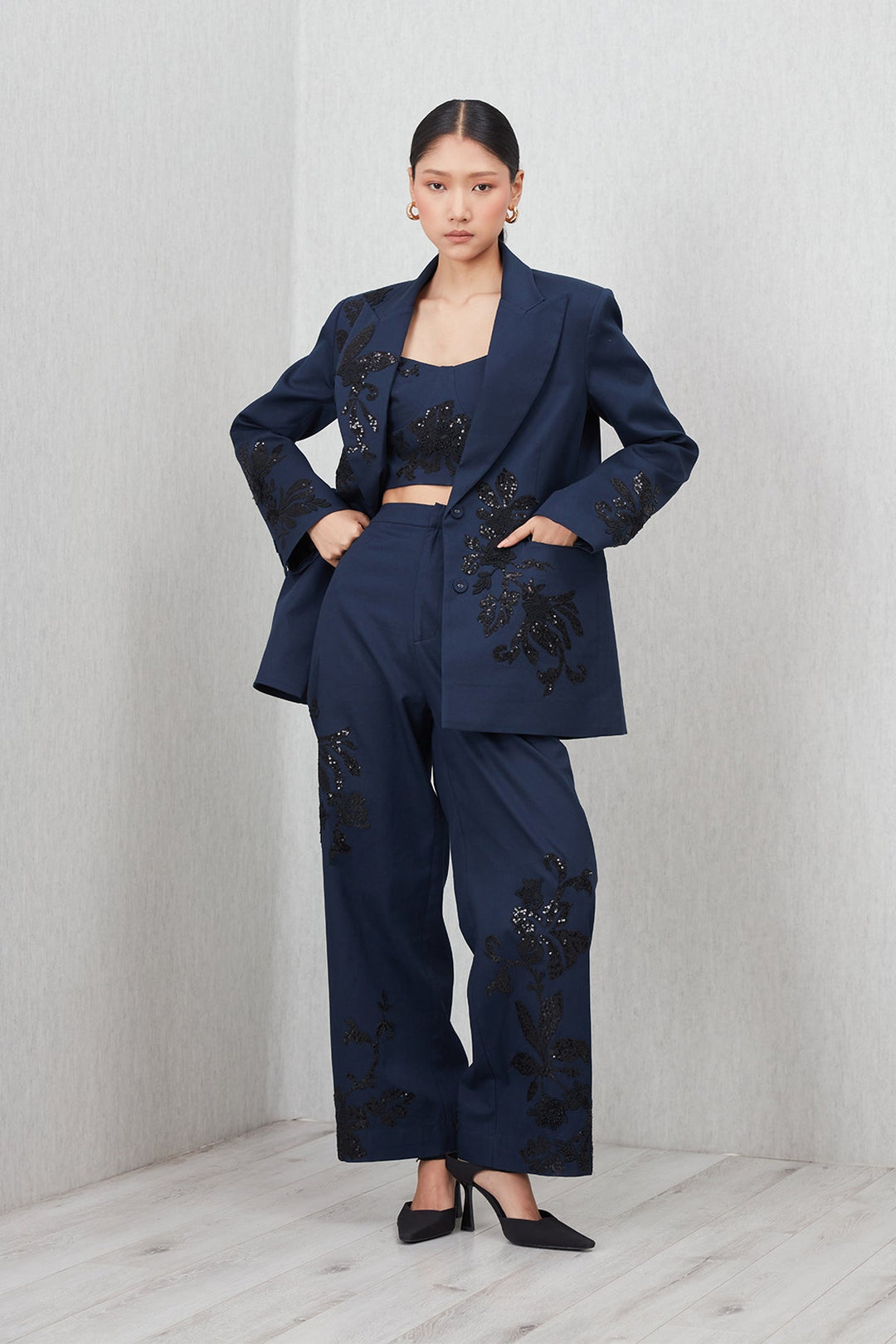 Ranna Gill Amara Oversized Jacket in navy blue cotton twill with Black floral sequin embroidery.