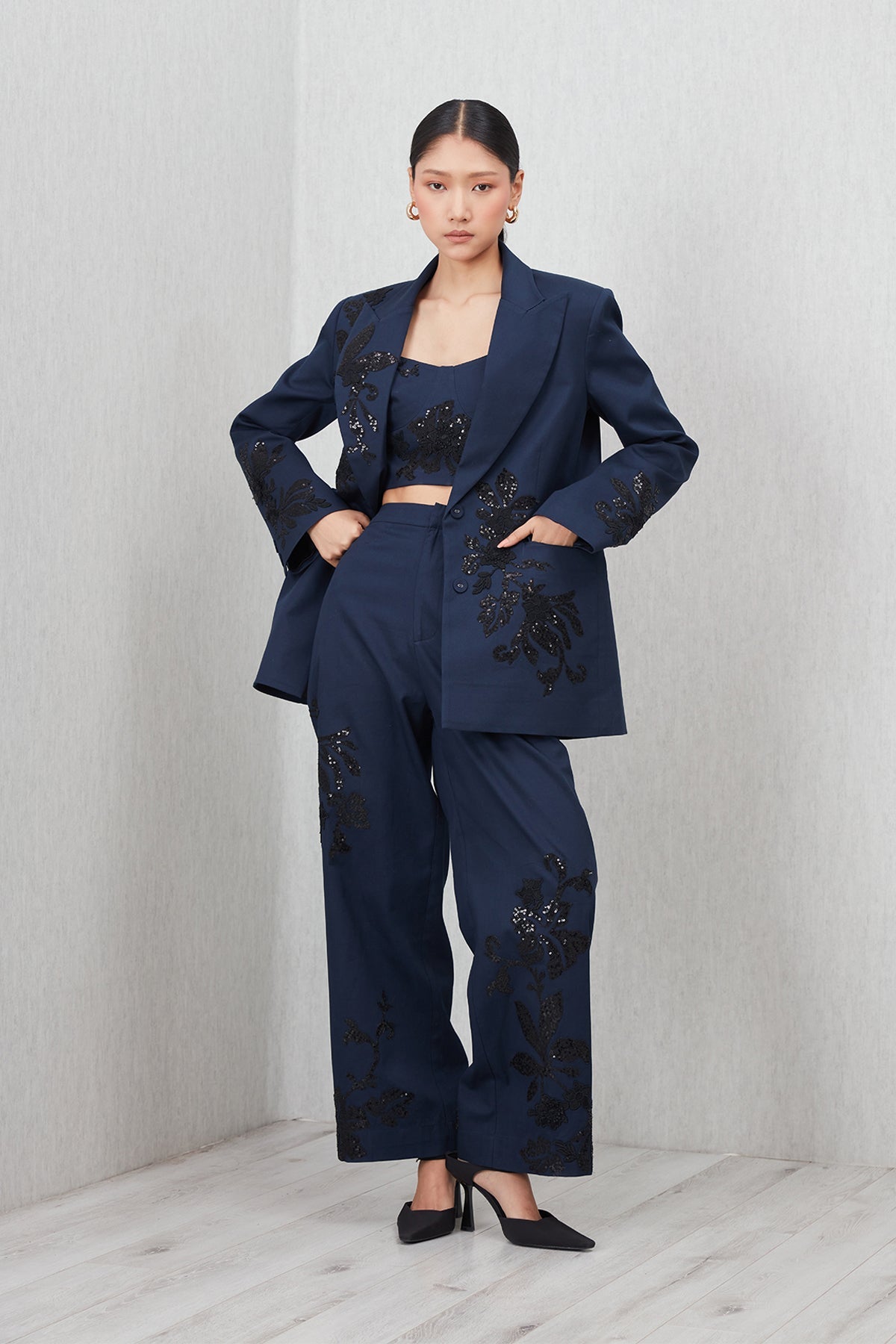 Ranna Gill Amara Oversized Jacket in navy blue cotton twill with Black floral sequin embroidery.