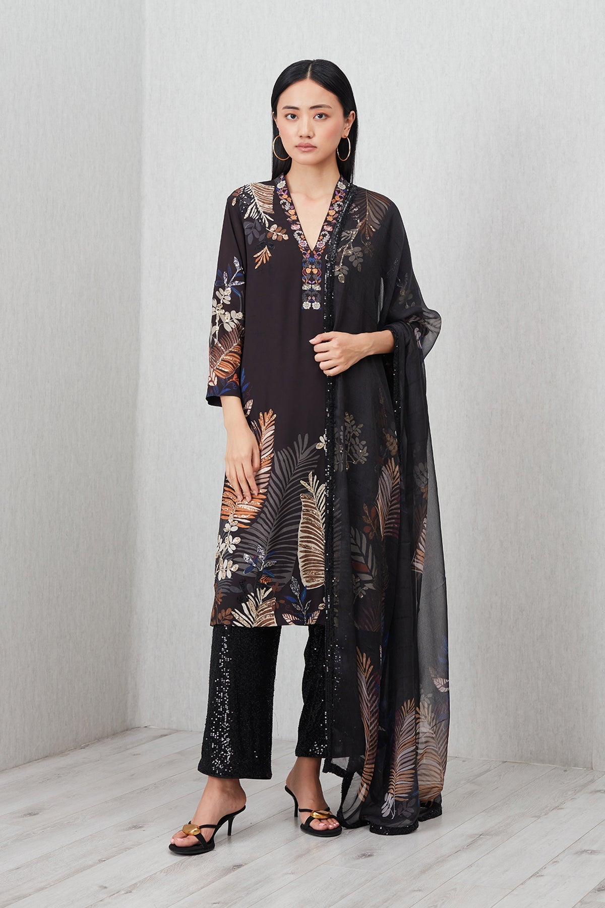 Ranna Gill Virelle Tunic Set in black with foliage print & mirror neckline.