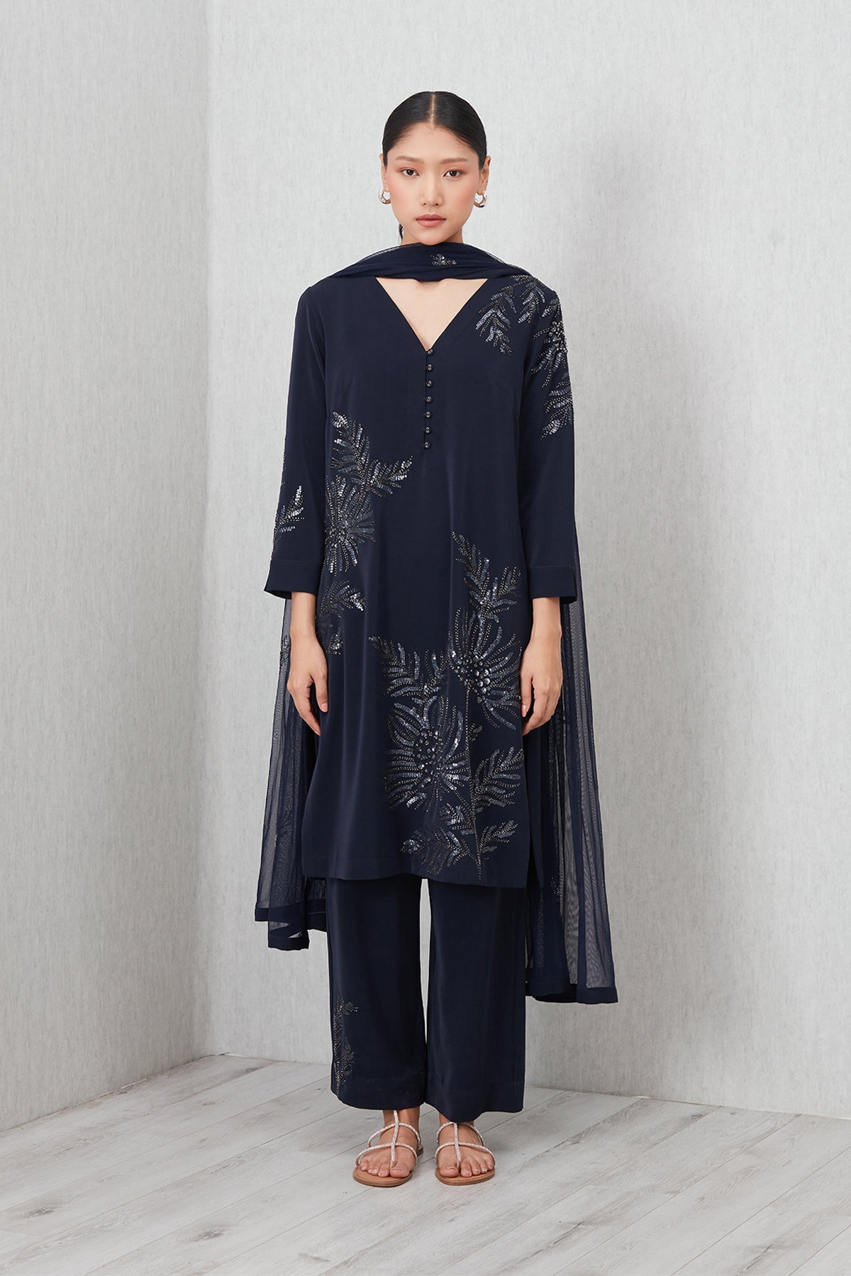 Ranna Gill Tara Tunic Set in navy blue with sequin floral embroidery, featuring a V-neck tunic, straight pants, and matching dupatta.