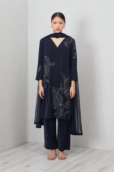 Ranna Gill Tara Tunic Set in navy blue with sequin floral embroidery, featuring a V-neck tunic, straight pants, and matching dupatta.