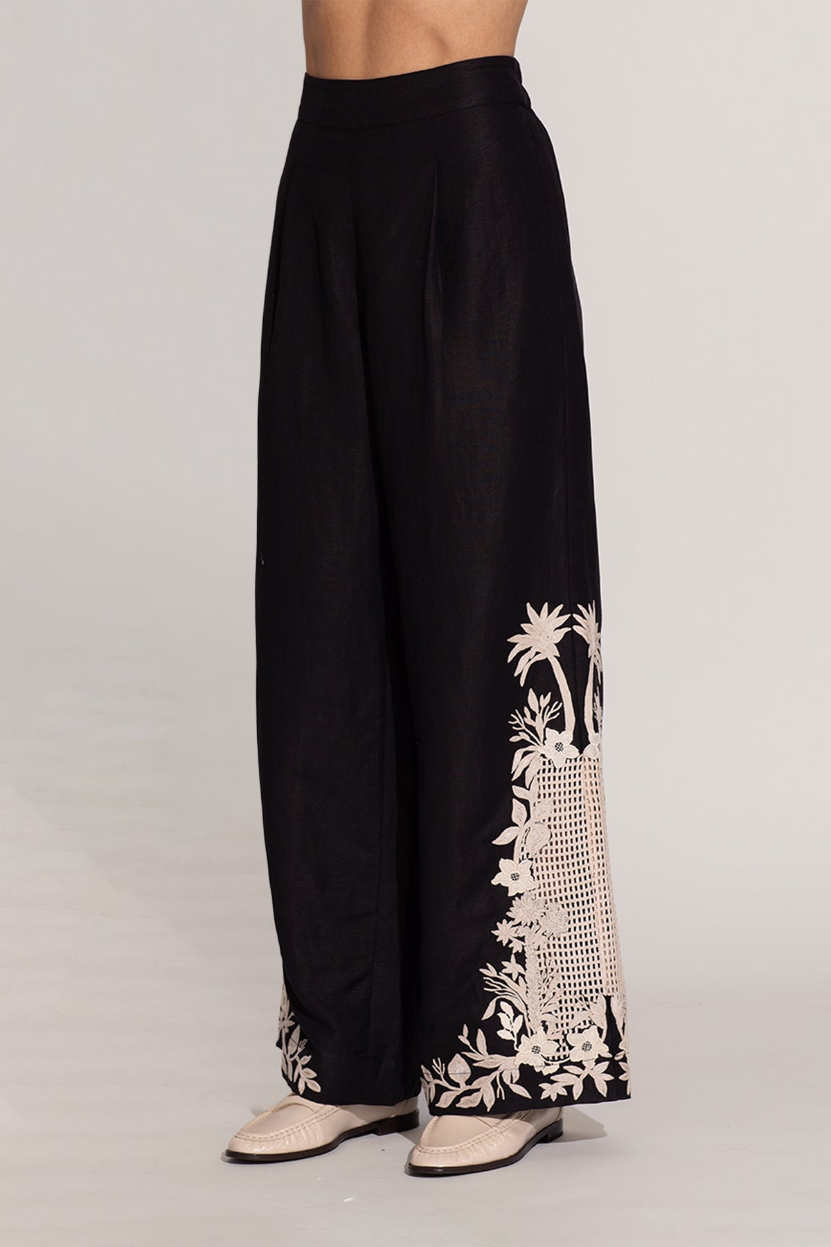 Ranna Gill Khloe black palazzo pants with ivory white floral embroidery. 