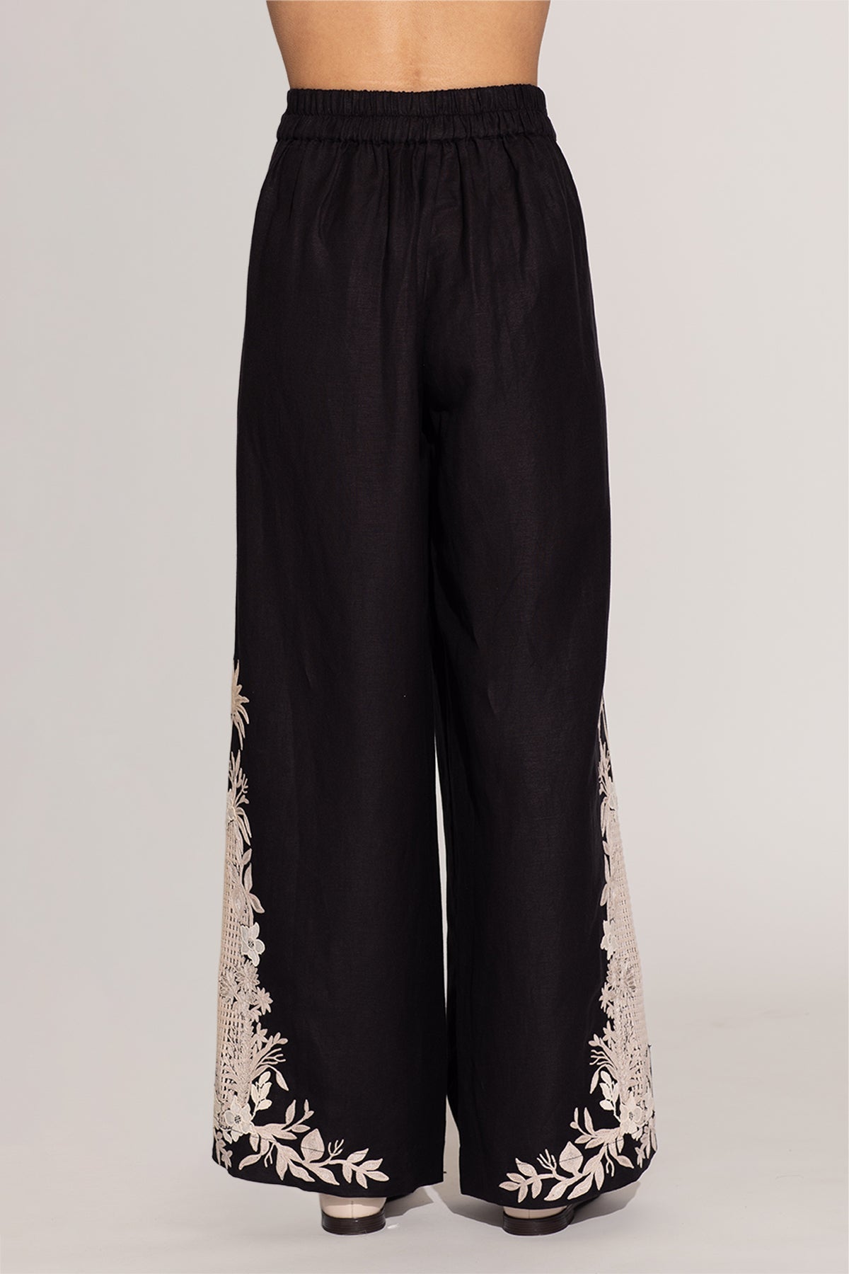 Ranna Gill Khloe black palazzo pants with ivory white floral embroidery. 