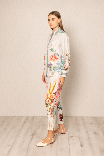 Ranna Gill Bora Co-ord Set in White linen with Floral buttondown shirt and tailored pants.