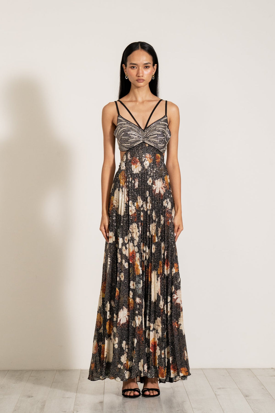 Macaw Dressa by Ranna Gill sleeveless, v-neck, maxi dress with a floral print and sequins, with crystal handwork embroidery on the bodice.