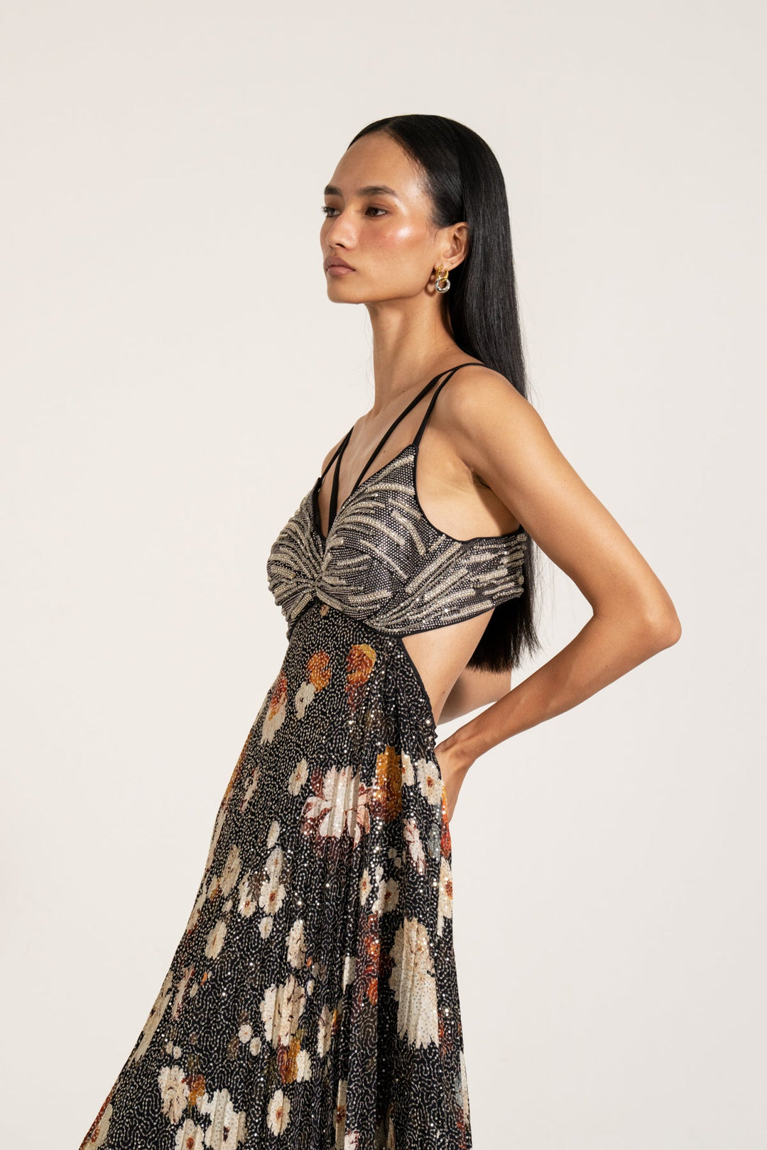 Macaw Dressa by Ranna Gill sleeveless, v-neck, maxi dress with a floral print and sequins, with crystal handwork embroidery on the bodice.